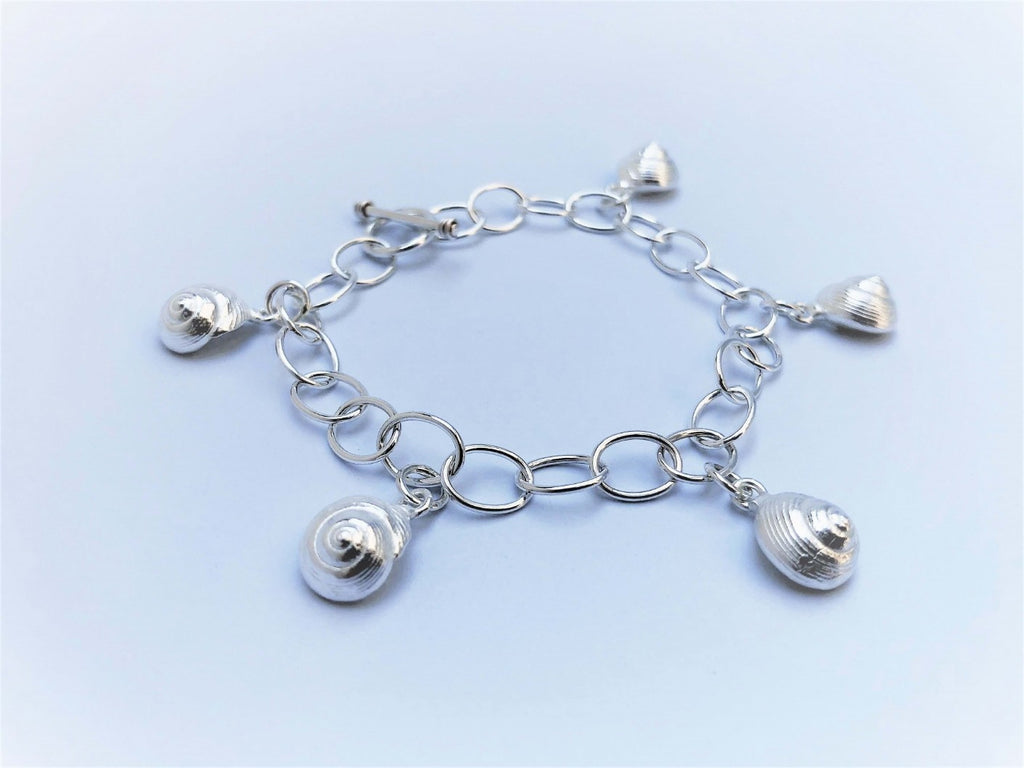 Shell and pebble charm bracelets