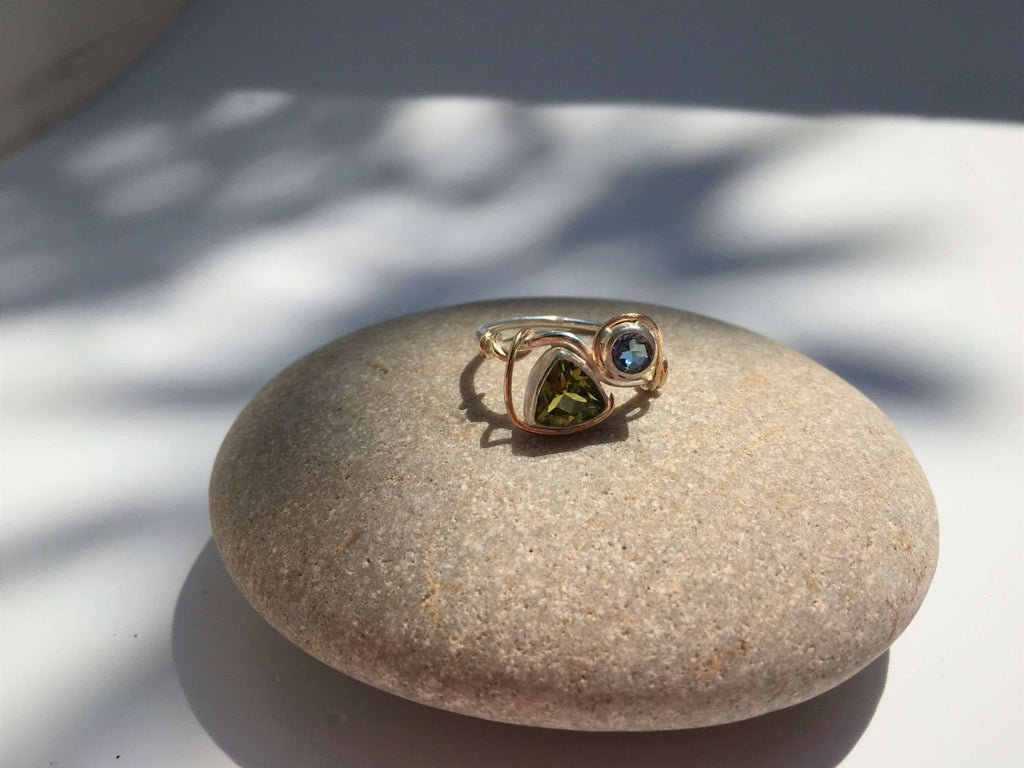 Peridot and blue topaz ring